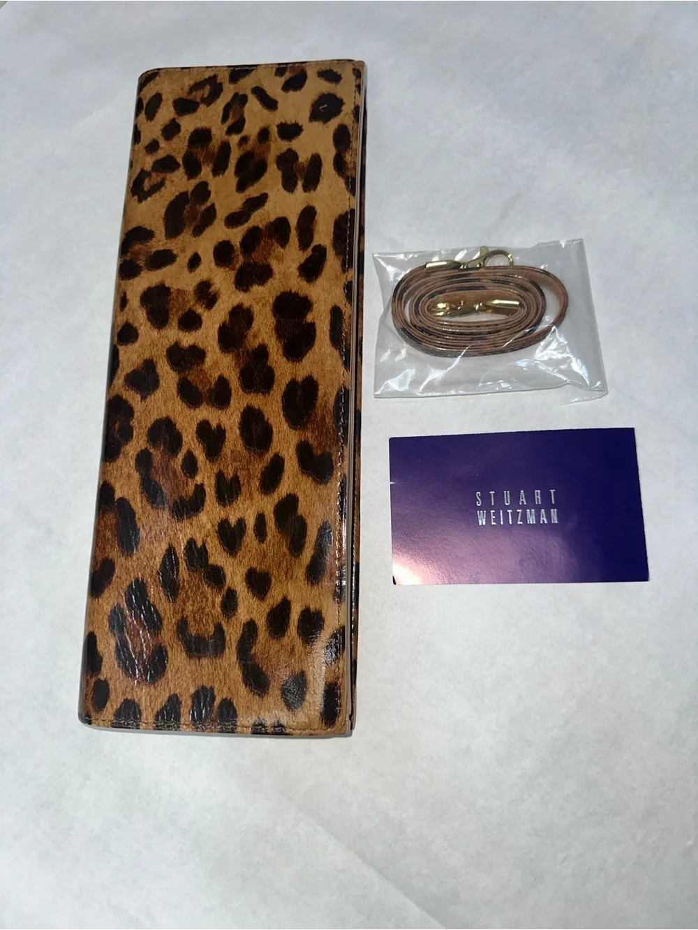 Stuart Weitzman patent leather Leopard clutch bag with a detachable strap